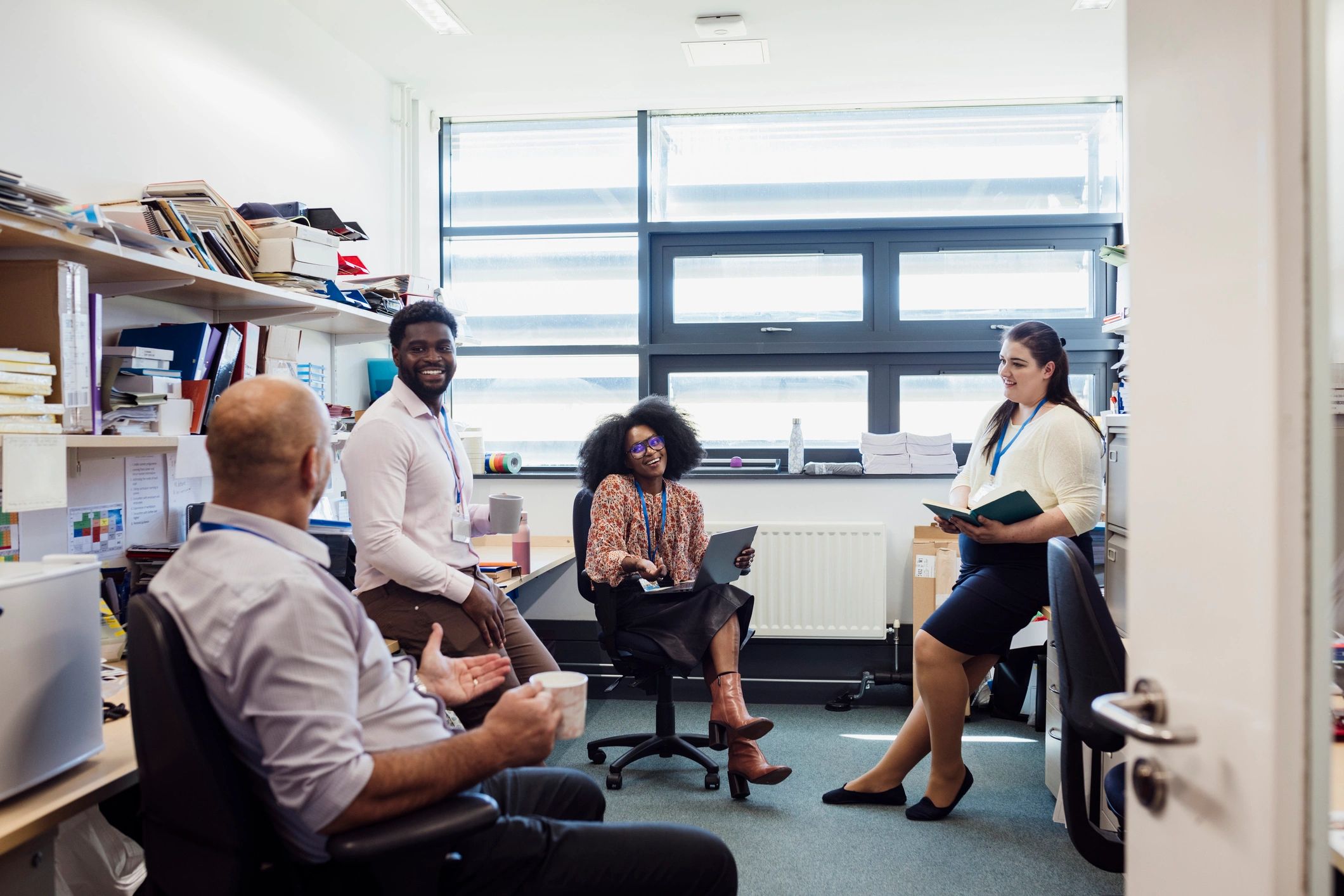 Education professionals meeting together in a supportive school setting