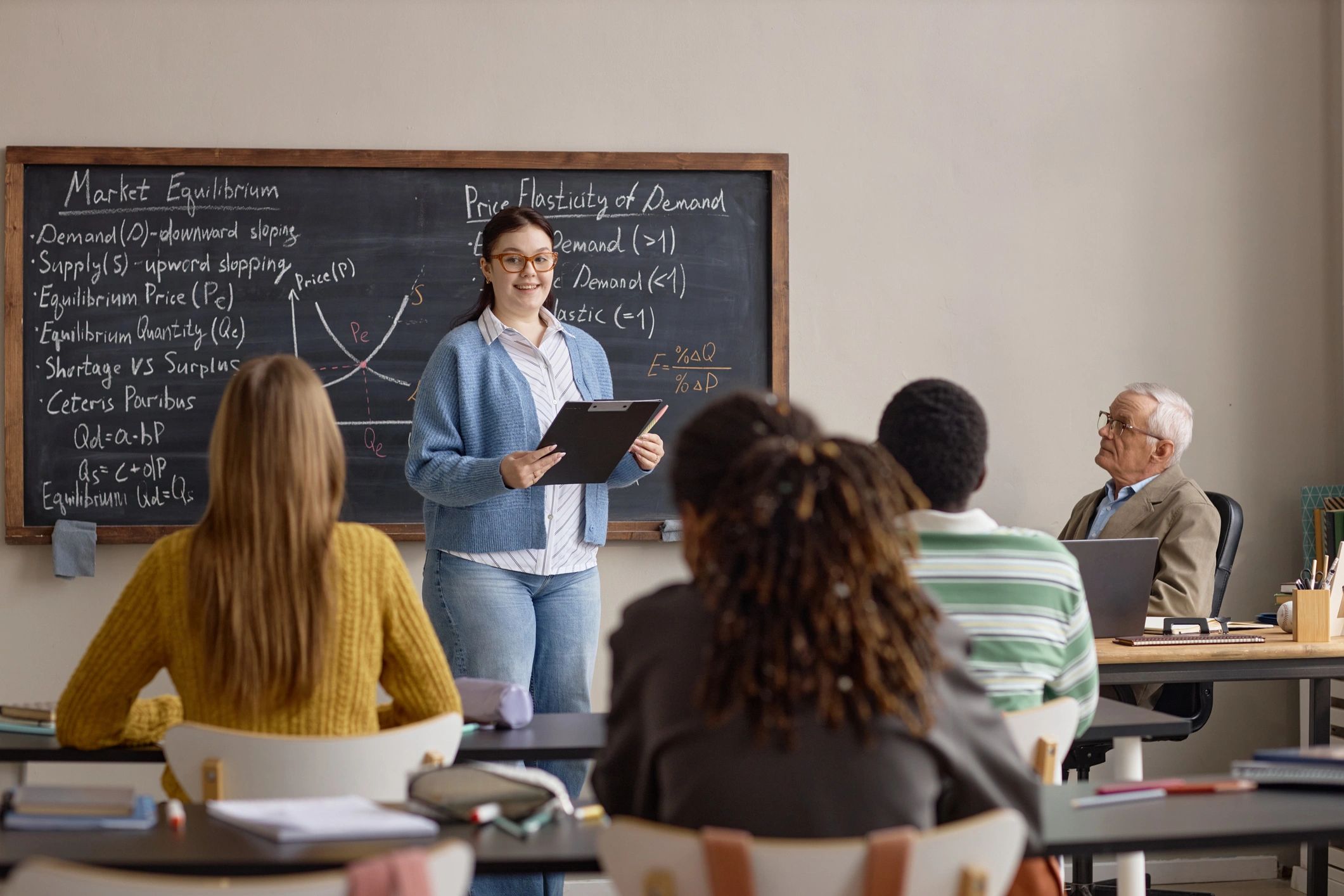 Teacher leading a classroom lesson